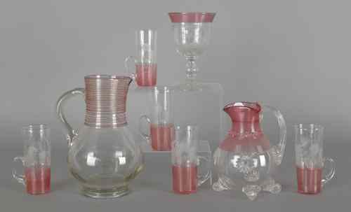 Appraisal: Eight pieces of cranberry threaded colorless glass tallest -