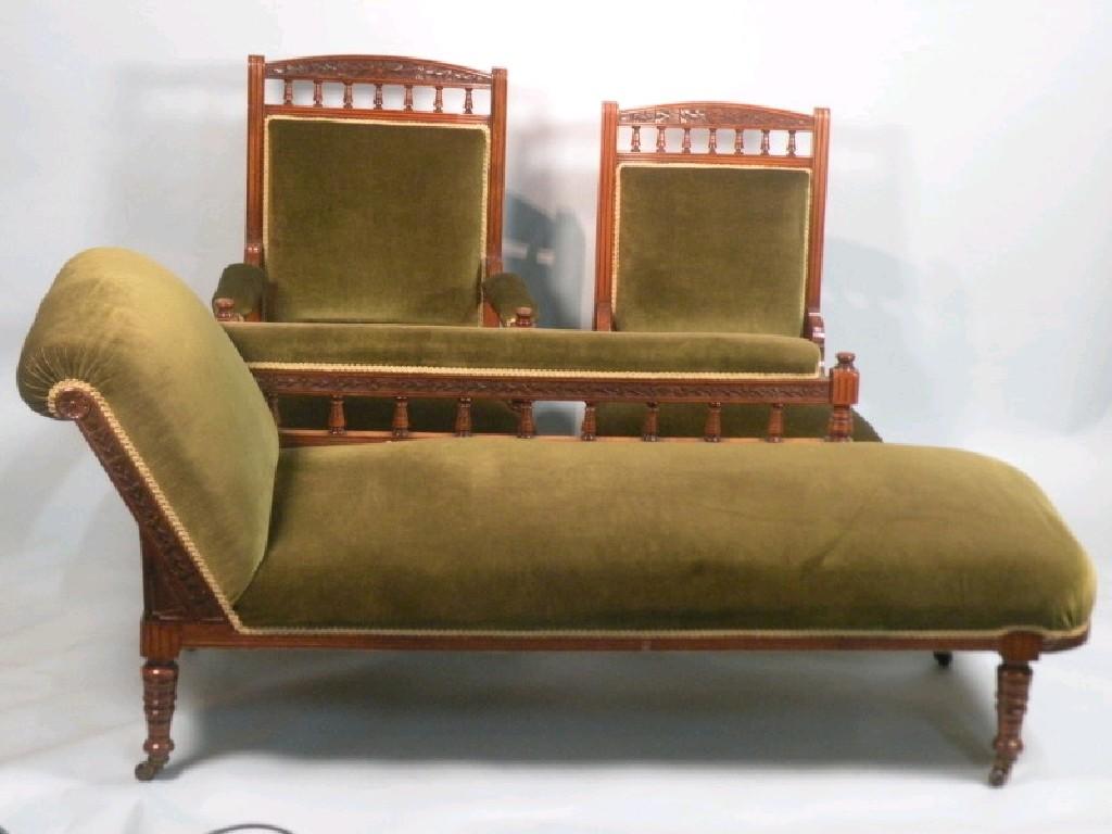 Appraisal: A late Victorian walnut chaise longue with a padded back