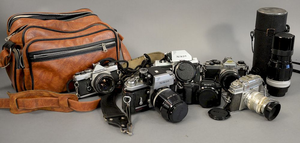 Appraisal: Vintage camera lot including three Nikons and lense Vintage camera