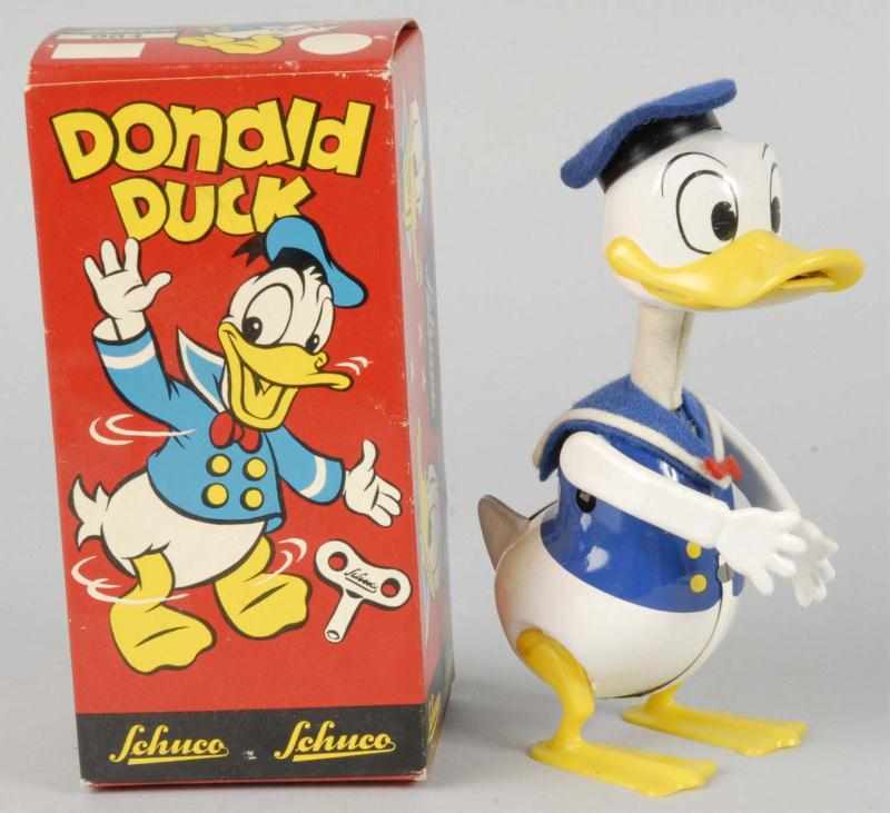 Appraisal: Tin Schuco Walt Disney Donald Duck Wind-Up Toy Description German