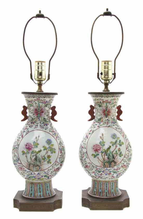 Appraisal: A Pair of Chinese Vases having flared rims with iron