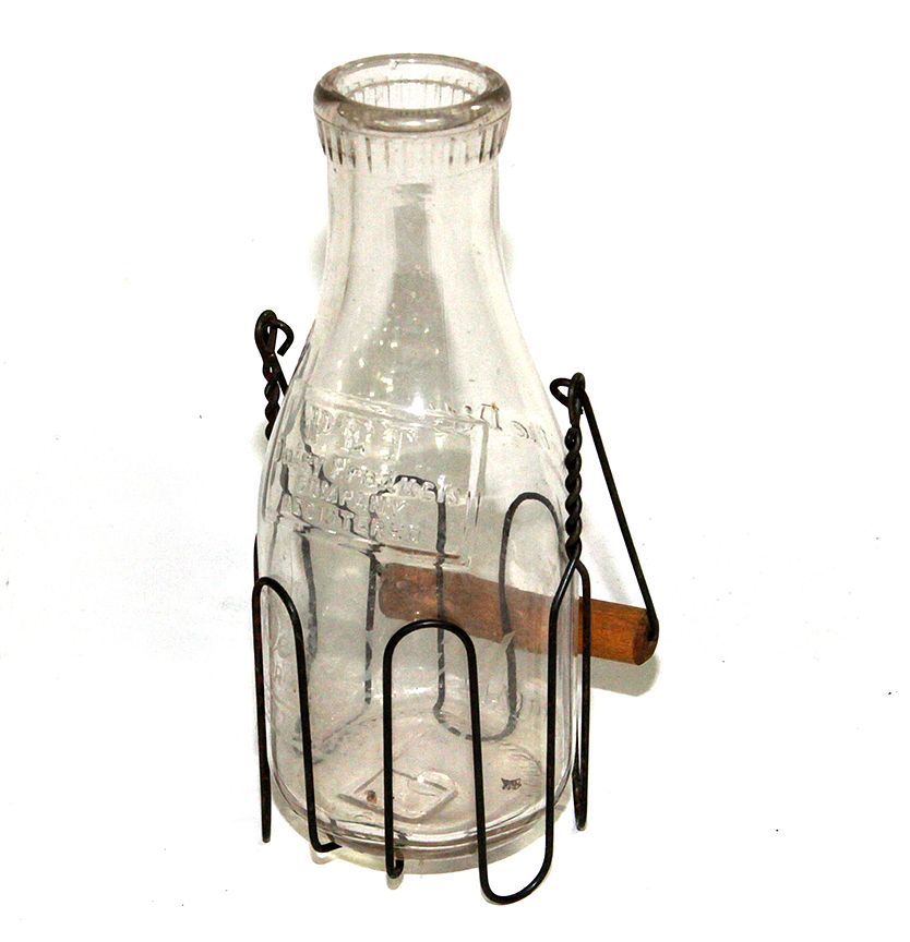 Appraisal: Pet Milk Bottle A quart embossed Pet bottle also acid