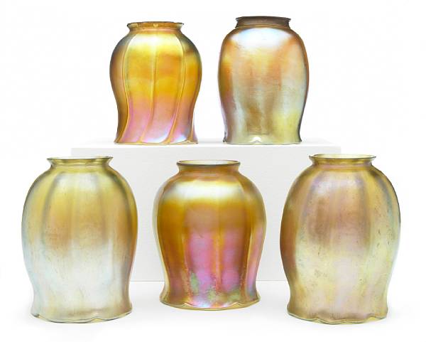 Appraisal: An assembled group of five Tiffany Favrile glass shades -