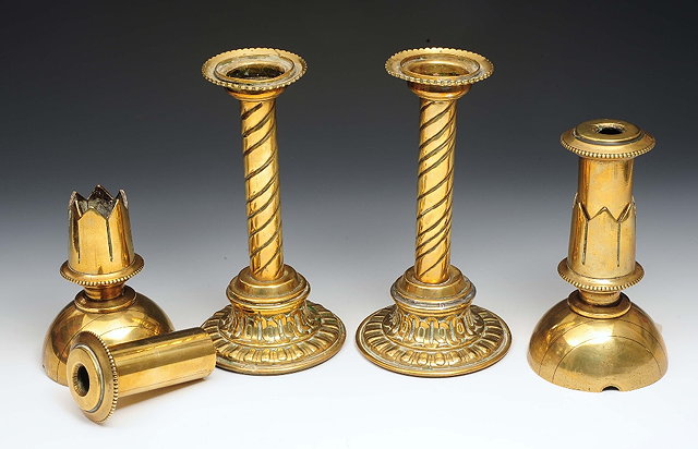 Appraisal: Two pair of brass candlesticks th Century largest cm