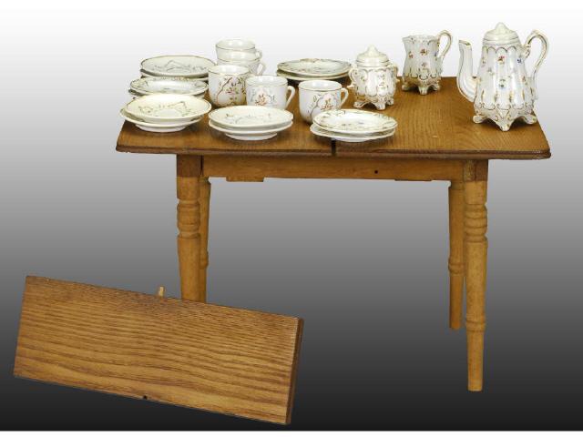 Appraisal: Miniature Extension Table China Accessories Description Includes pieces of China