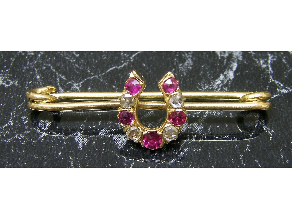 Appraisal: ct 'lucky horseshoe' brooch set with diamonds and rubies in