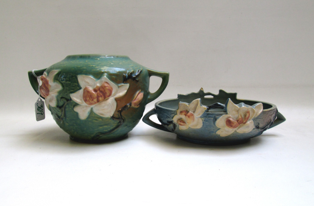 Appraisal: TWO ROSEVILLE ART POTTERY PIECES in the Magnolia pattern jardiniere