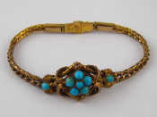 Appraisal: An antique carat gold turquoise bracelet with locket compartment and