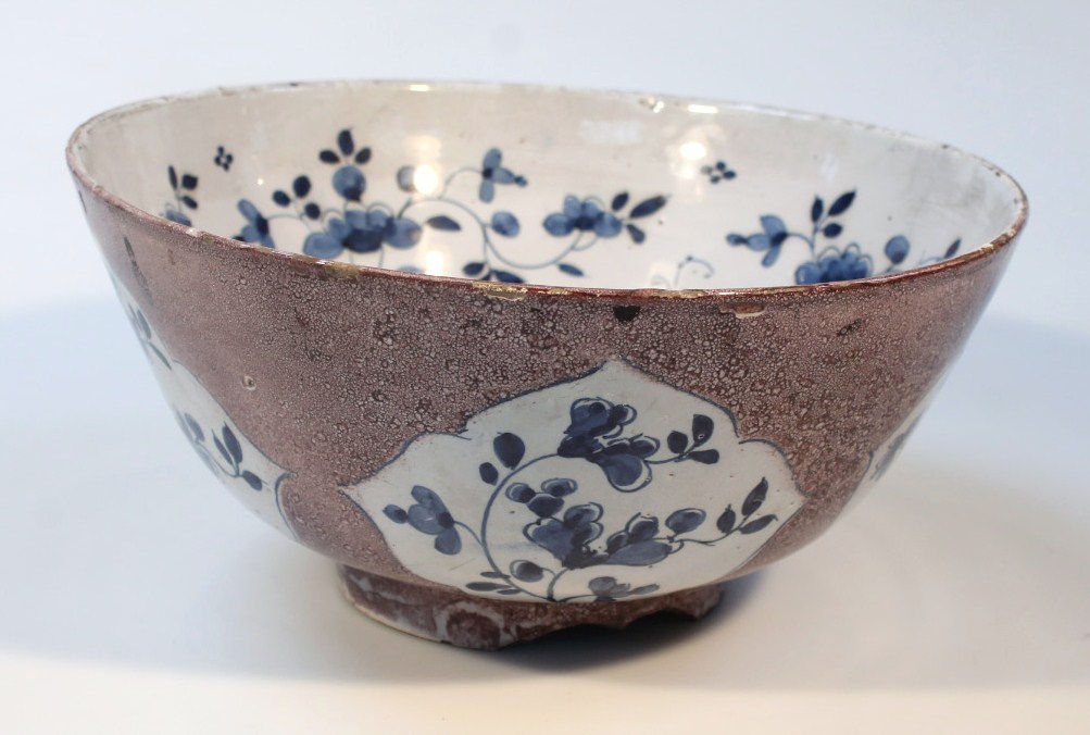 Appraisal: A mid- thC English Delft punch bowl the exterior decorated