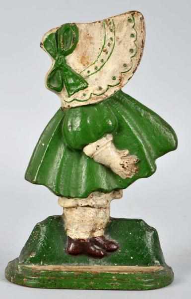 Appraisal: Cast Iron Girl with Bow Doorstop Description National Foundry Company