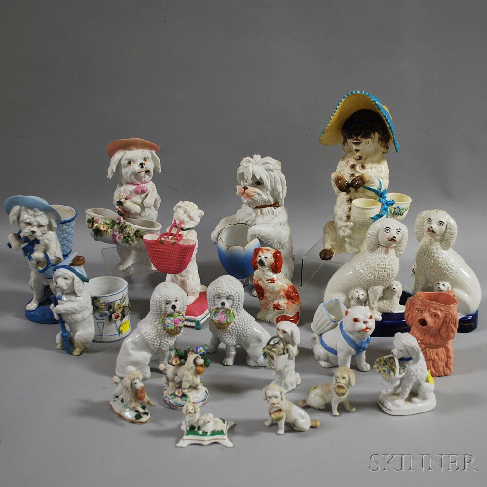 Appraisal: Twenty Ceramic Dog Figures ht to in Estimate - minor