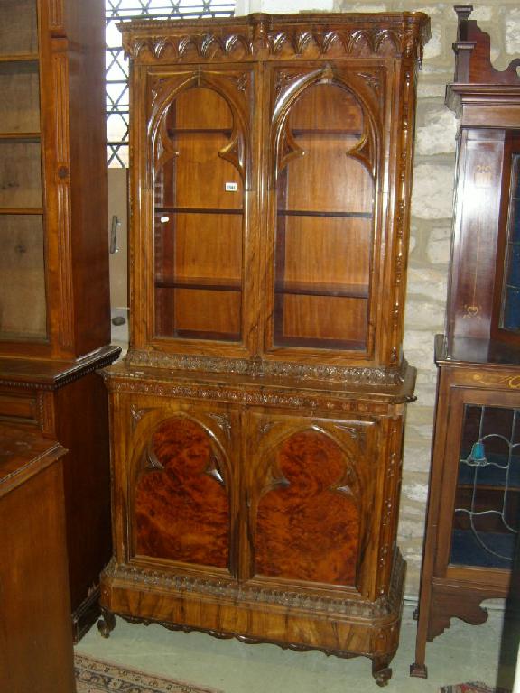 Appraisal: A th century gothic revival library bookcase principally in olive