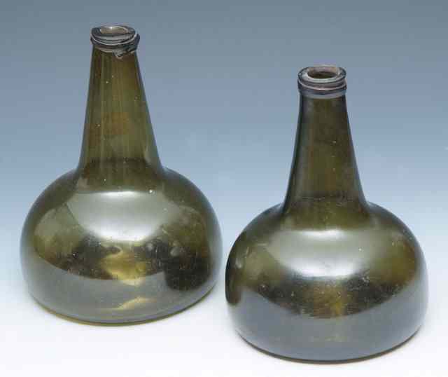 Appraisal: A PAIR OF DUTCH EARLY TH CENTURY GREEN GLASS ONION