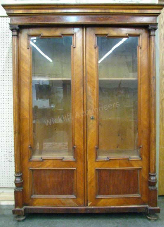 Appraisal: Antique glass door bookcase mahogany with mahogany veneer full fluted