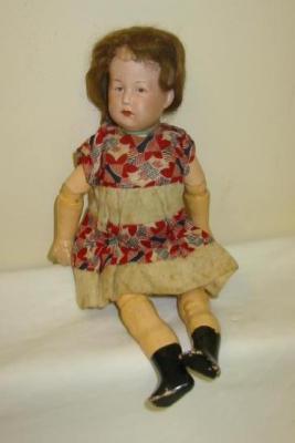 Appraisal: A Heubach bisque head character doll with intaglio eyes and