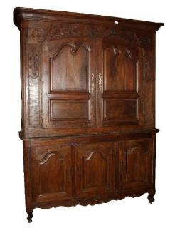 Appraisal: French Provincial buffet deux corps in oak th century h