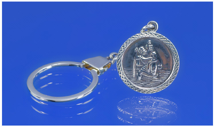 Appraisal: Douglas Pell A Silver key ring with St Christopher fob