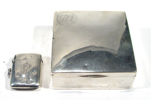 Appraisal: Square silver cigarette box with hinged lid and a silver