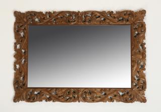 Appraisal: Pierce carved mirror in the Renaissance taste Carved mirror in