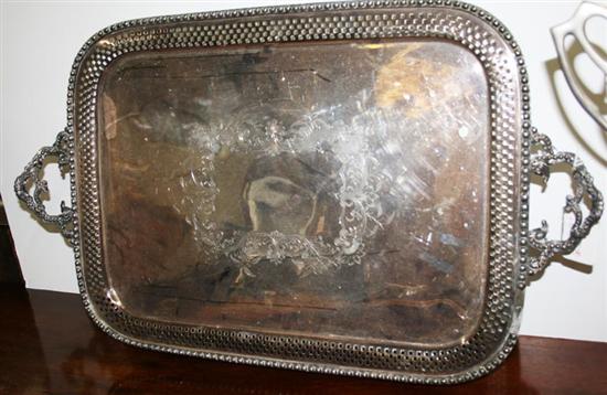 Appraisal: American silverplate serving tray th century pierced and beadwork border