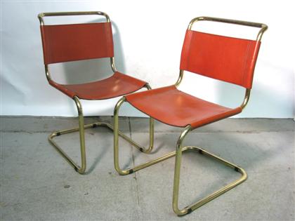 Appraisal: Matt Stam th century pair gold painted steel and leather