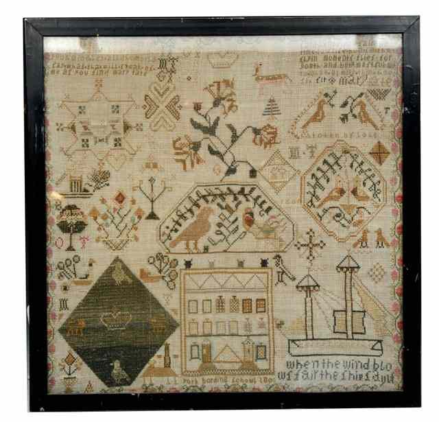 Appraisal: AN ANTIQUE WOOLWORK SAMPLER with various stylised designs marked York