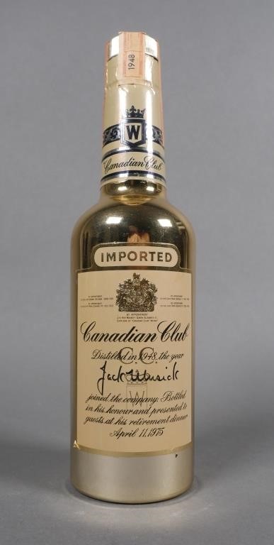 Appraisal: Extremely rare gold covered Canadian Club whiskey bottle sealed with