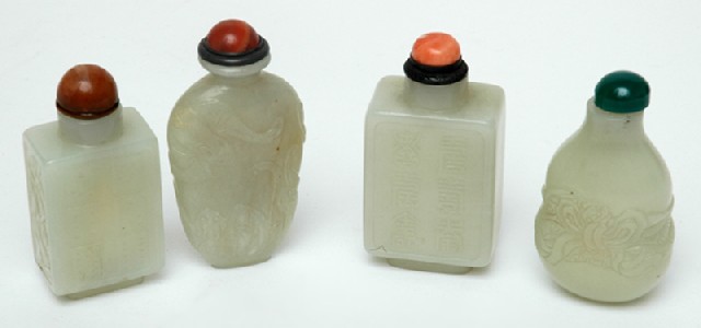 Appraisal: FOUR CHINESE CARVED JADE SNUFF BOTTLES Qing Dynasty and later