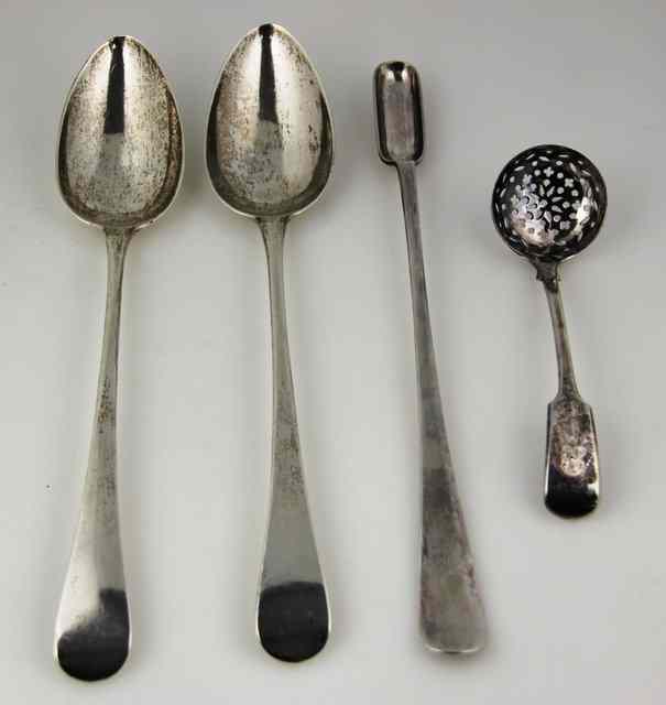 Appraisal: A near pair of silver serving spoons Wilkes Booth London