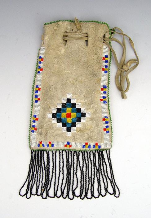 Appraisal: PLAINS INDIAN BEADED PULLSTRING POUCH Deerskin with each side decorated