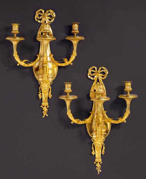 Appraisal: PAIR OF GILT BRONZE APPLIQUES A LA LYRE Louis XVI