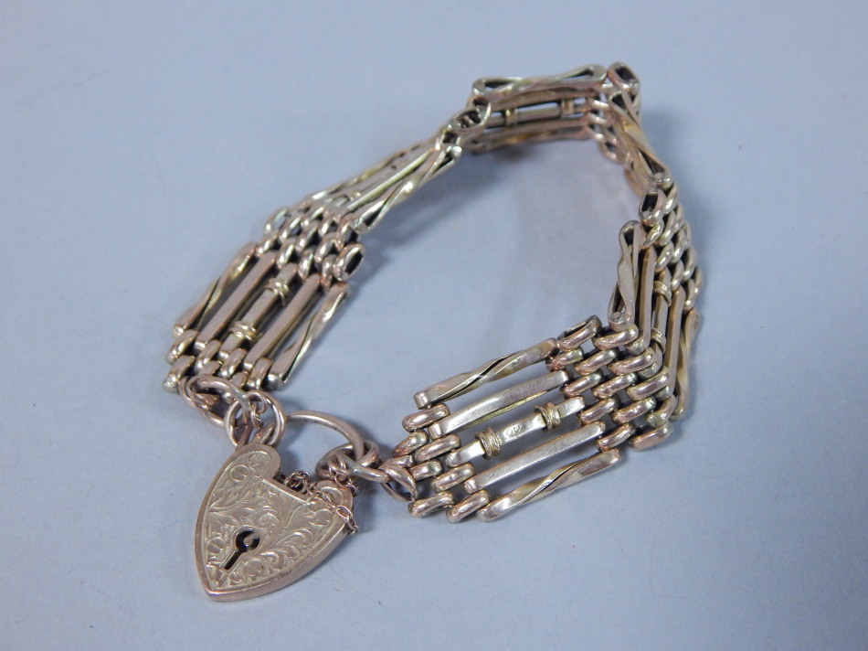 Appraisal: A ct gold gate bracelet with padlock g all in