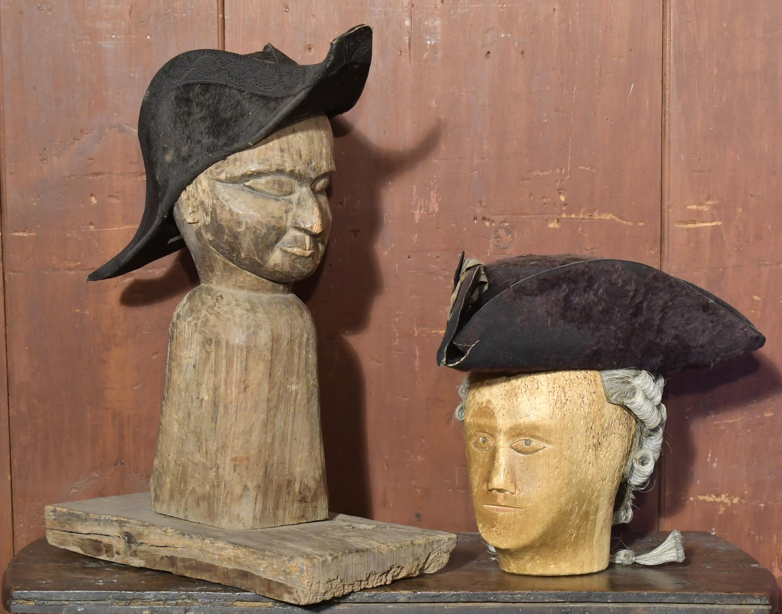 Appraisal: TWO ANTIQUE FOLK ART CARVINGS W HATS A carved and