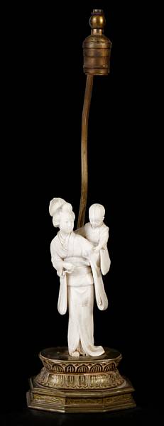 Appraisal: A Japanese ivory figure of a woman and child now