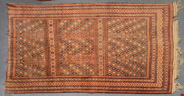 Appraisal: A BELOUCH SMALL CARPET decorated stylistic designs in panels and