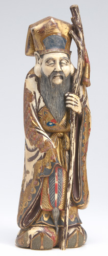 Appraisal: JAPANESE IVORY Stained and painted carved okimono of a bearded