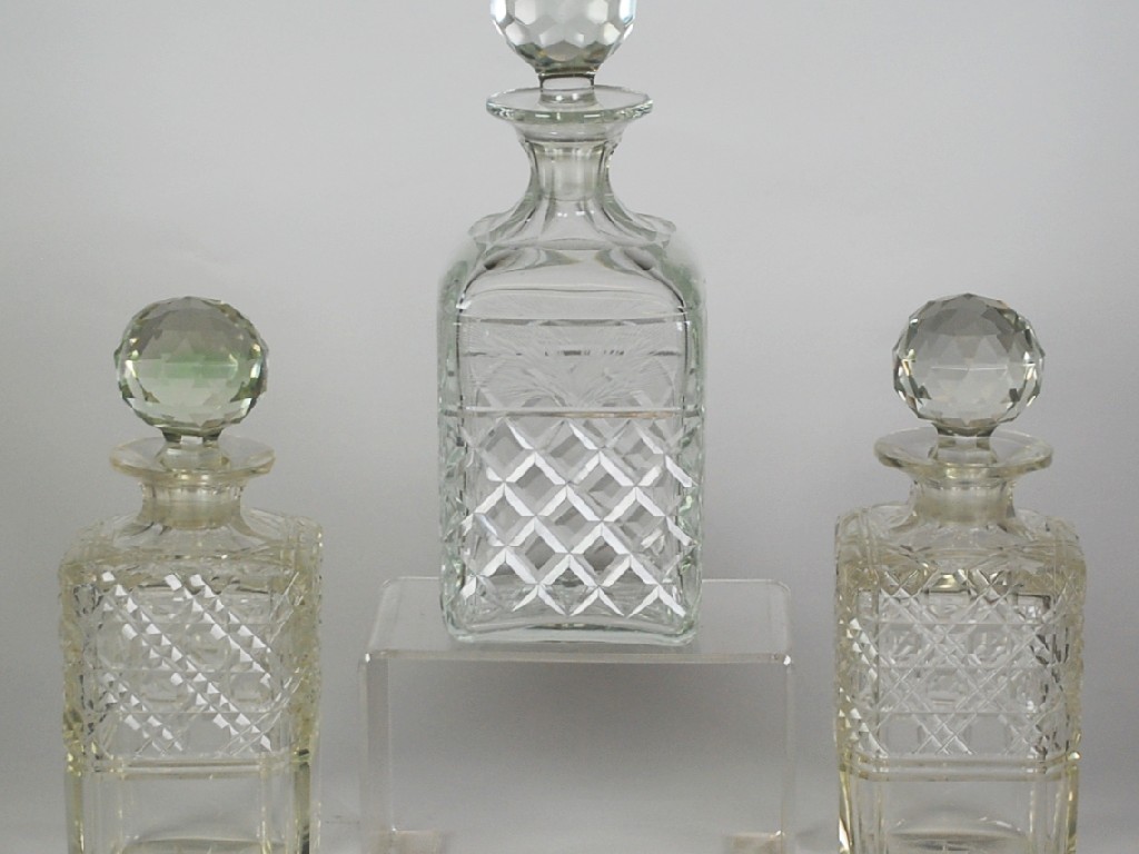 Appraisal: PAIR OF CUT GLASS DECANTERS WITH STOPPERS cm high and