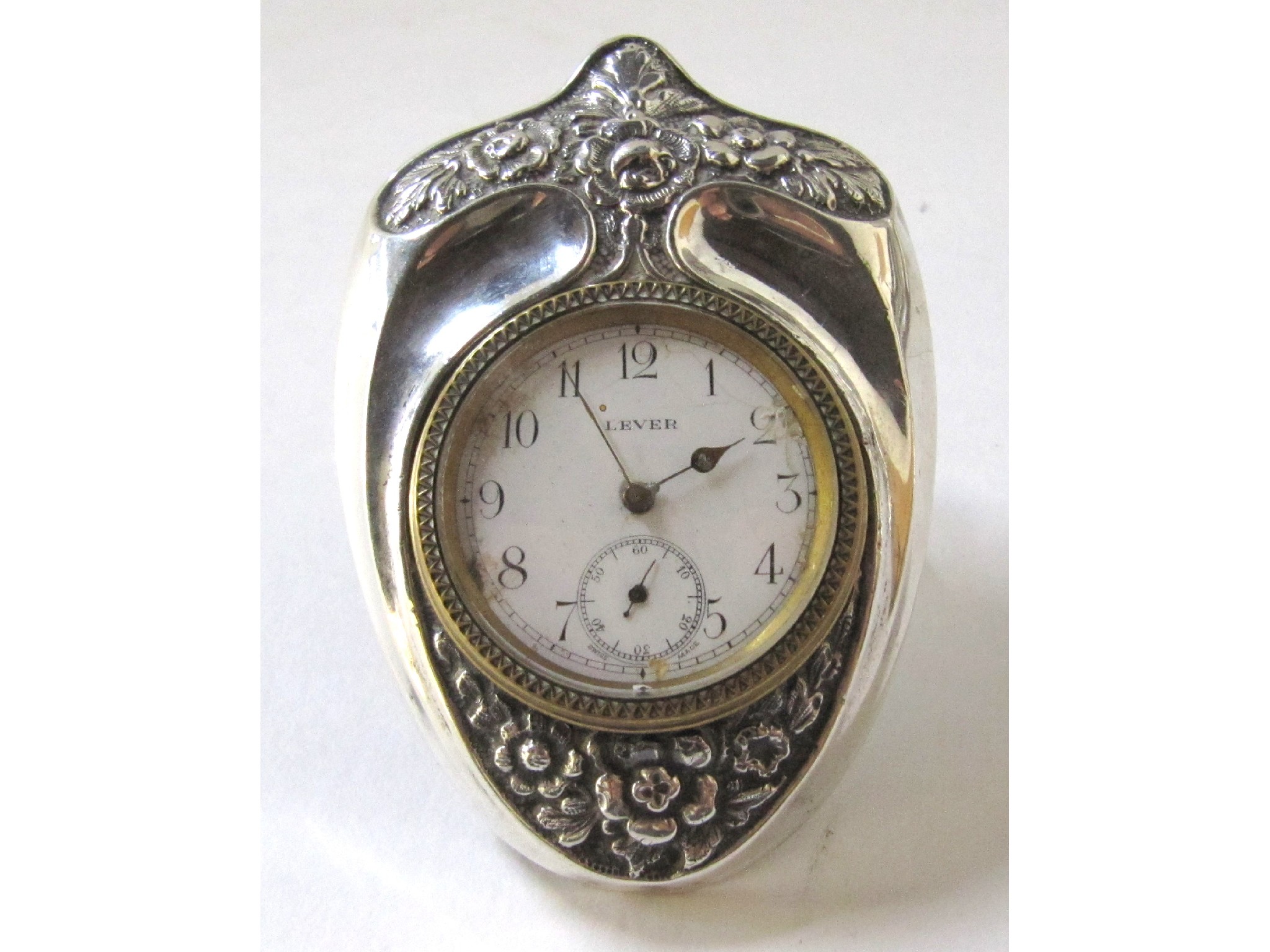 Appraisal: A silver cased desk clock Birmingham