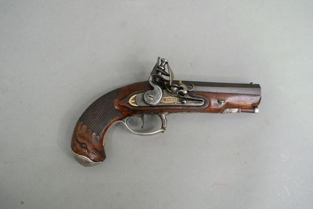 Appraisal: A small greatcoat flintlock single shot pistol caliber inch barrel