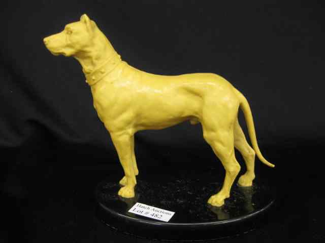 Appraisal: Celluloid Figurine of a Dog deco era black oval base