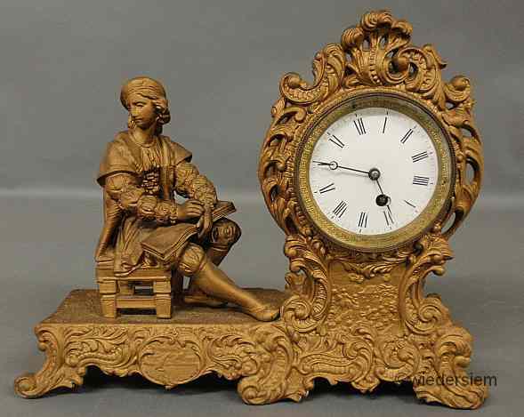 Appraisal: Spelter metal mantel clock with a porcelain dial with Roman