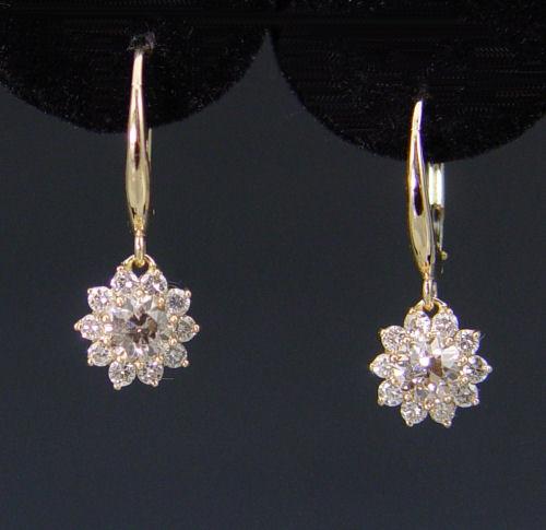 Appraisal: K CHAMPAGNE DIAMOND DANGLE EARRINGS K yellow gold earrings contain