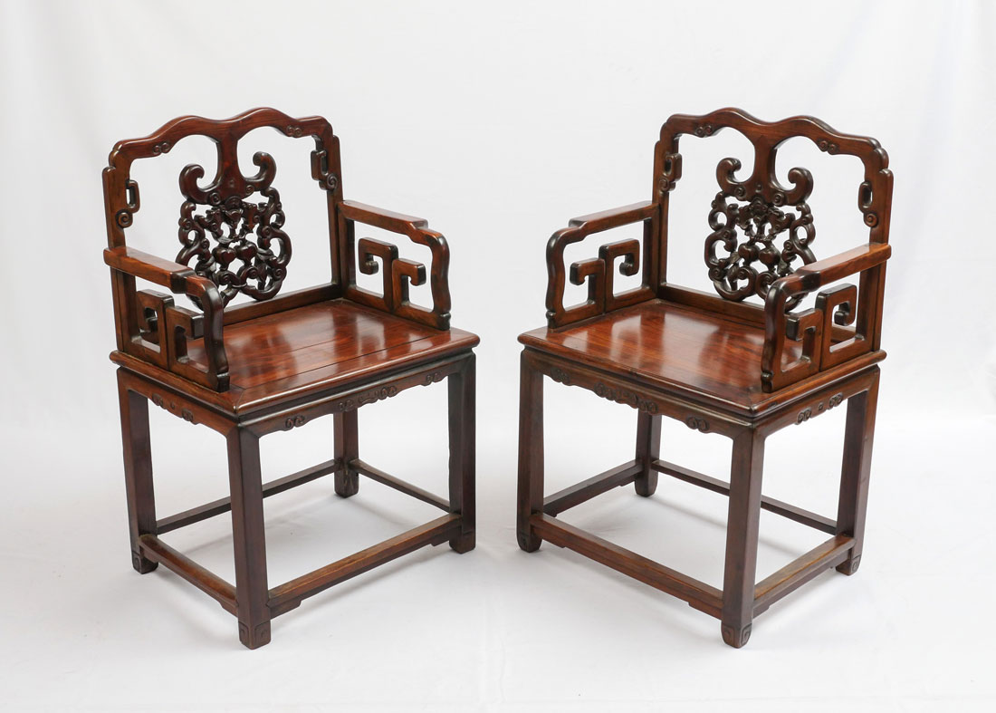 Appraisal: HEAVY ROSEWOOD CHINESE ARM CHAIRS HUANGHUALI Nicely detailed carved and