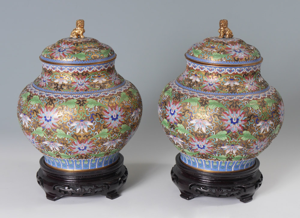 Appraisal: PAIR OF CLOISONNE COVERED JARS Gilt ground with raised polychrome