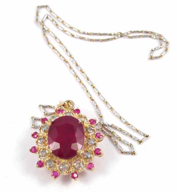 Appraisal: RUBY DIAMOND AND FOURTEEN KARAT GOLD PENDANT NECKLACE the pendant