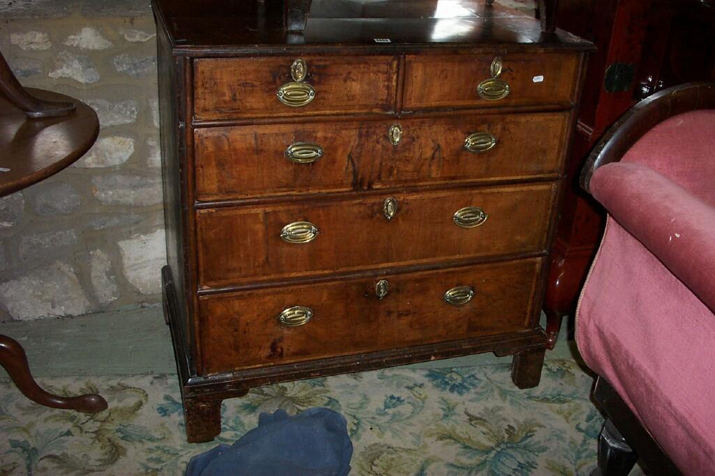 Appraisal: An th century country made walnut and pine chest of