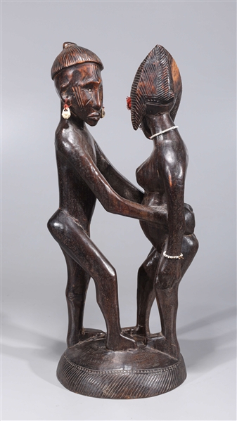 Appraisal: Carved wood African statue of two figures carved from a