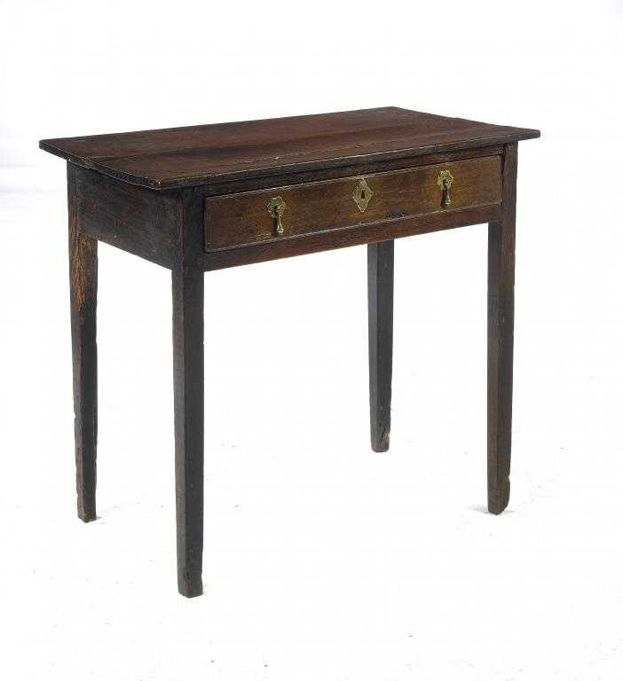 Appraisal: AN ENGLISH OAK SIDE TABLE with boarded top and scratch