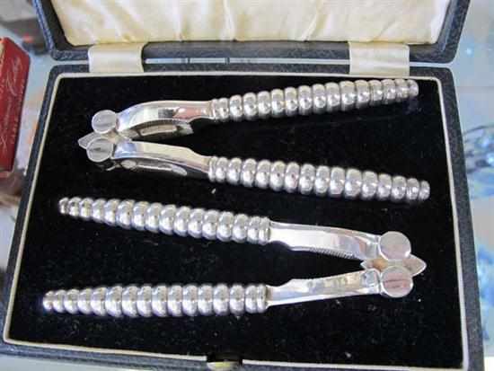 Appraisal: BOXED PAIR OF SILVER PLATE NUT CRACKERS