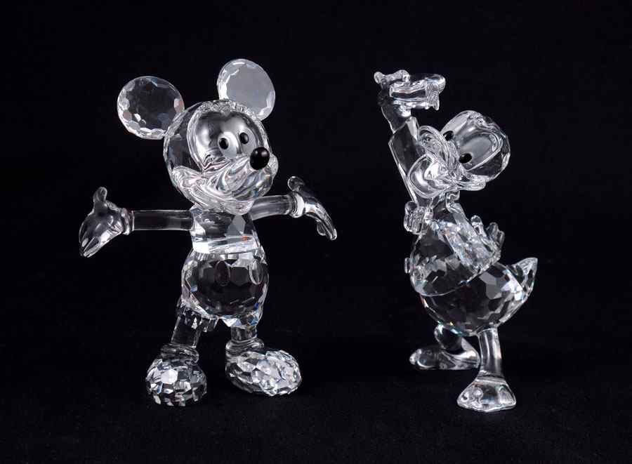 Appraisal: SWAROVSKI CRYSTAL DISNEY FIGURES MICKEY MOUSE issued ''h and DONALD